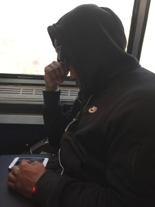 Wired millennial on Amtrak train